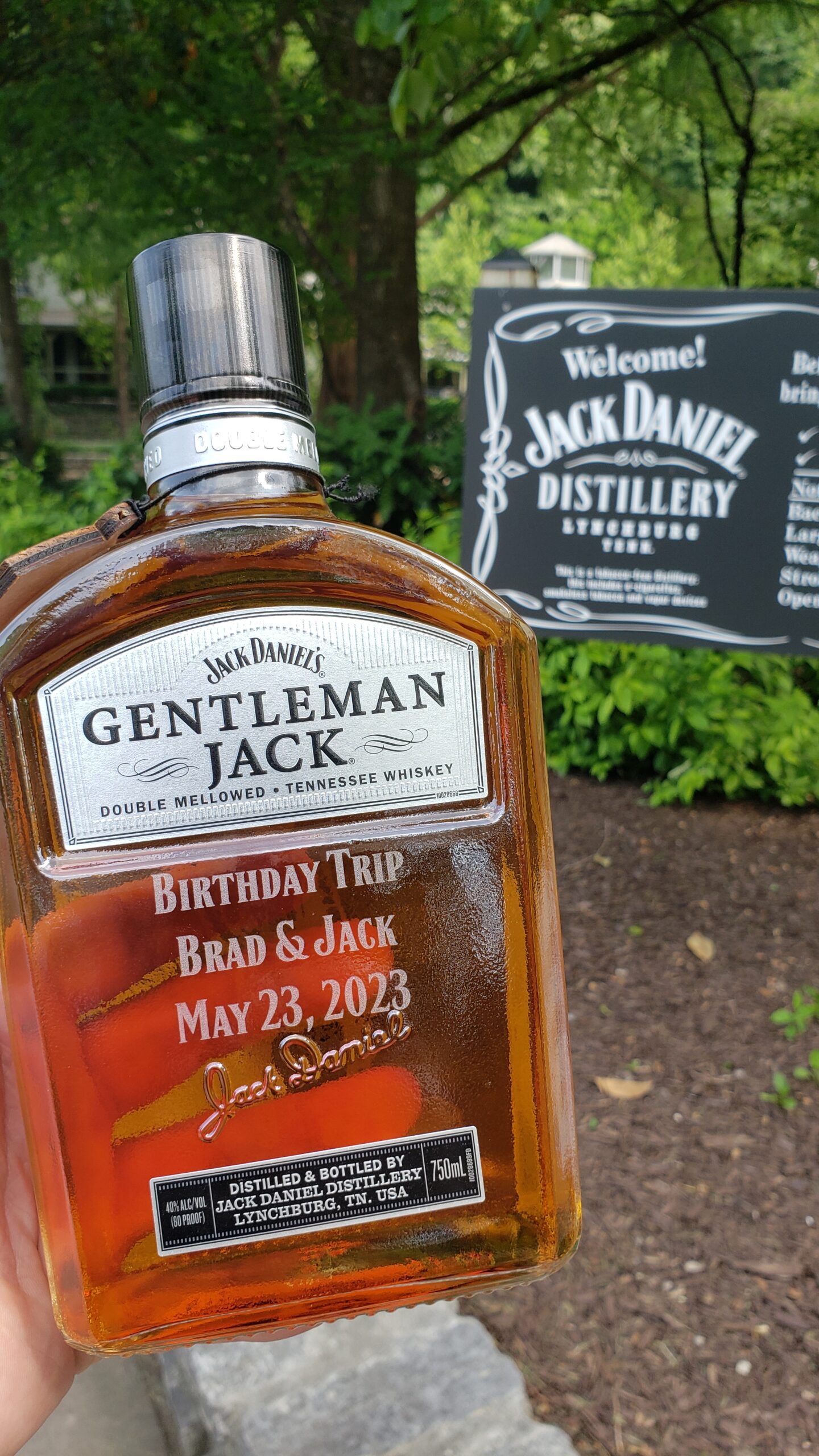 Jack Daniels Distillery Tour - Jack on the Rocks Bottle and Distillery Sign